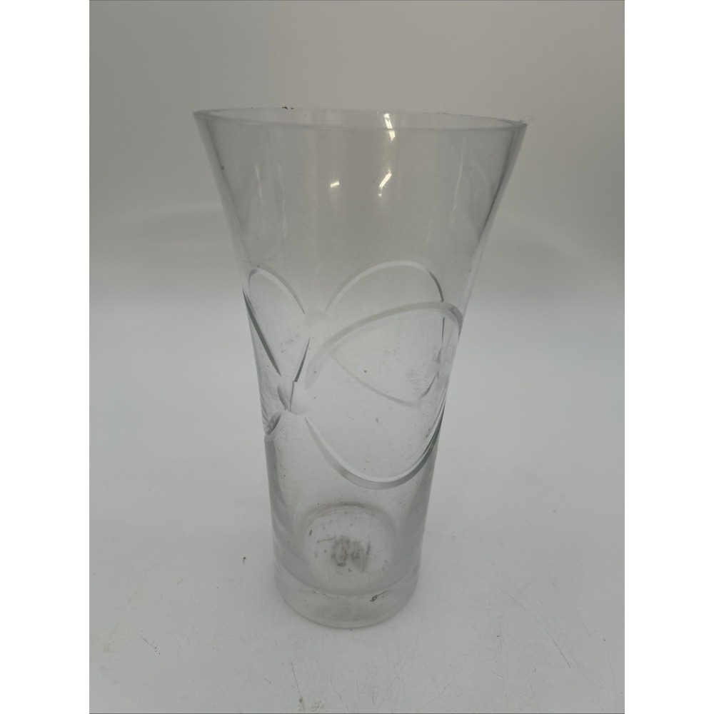 clear glass vase featuring an intertwined ring or loop design